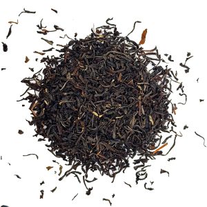 Loose black tea leaves scattered, royal golden assam black loose leaf tea, black tea, c tea house