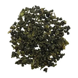 Dried green tea leaves scattered flat. silver mountain water loose lead tea, oolong tea, c tea house